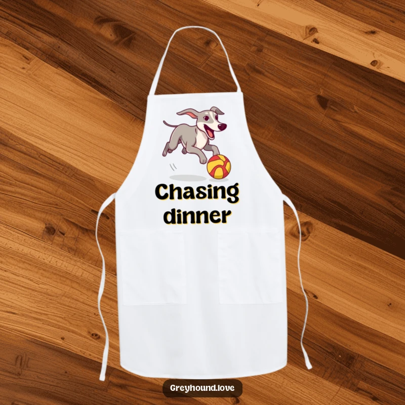 Funny Apron featuring a greyhound excitedly chasing a colorful, stylized ball, perfect for kitchen protection and playful cooking.