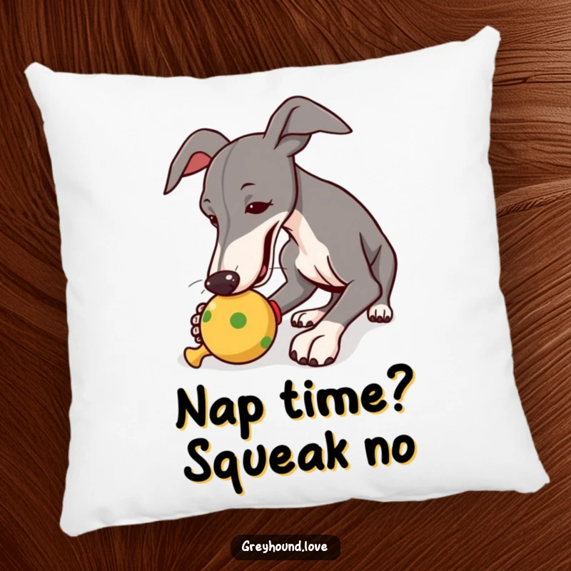 Funny pillow depicting a greyhound engrossed in nudging a squeaky toy, offering both comfort and amusement.