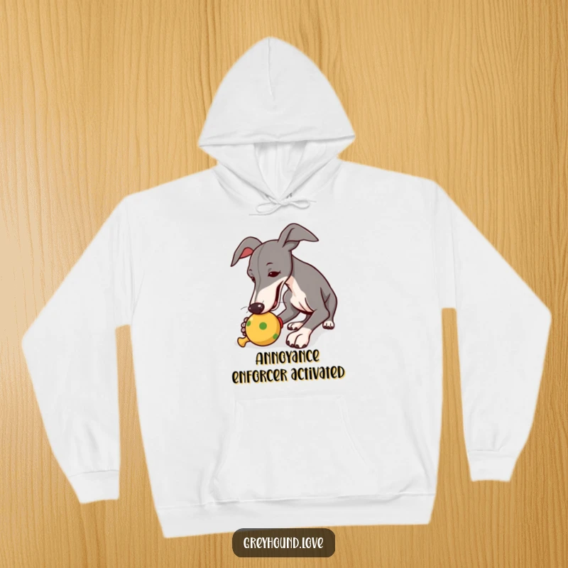Funny hoodie showing a greyhound passionately nudging a squeaky toy, radiating playful energy and warmth.