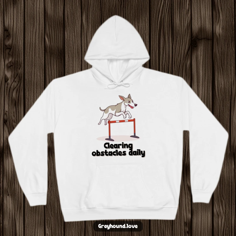 Funny Greyhound hoodie depicting a stylized dog leaping over a hurdle, offering warmth and motivational humor.