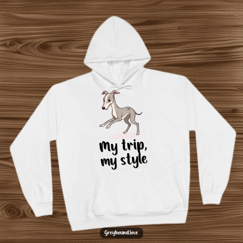 A cute, kawaii greyhound character comically tripping on its long legs, featured on a cozy hoodie.