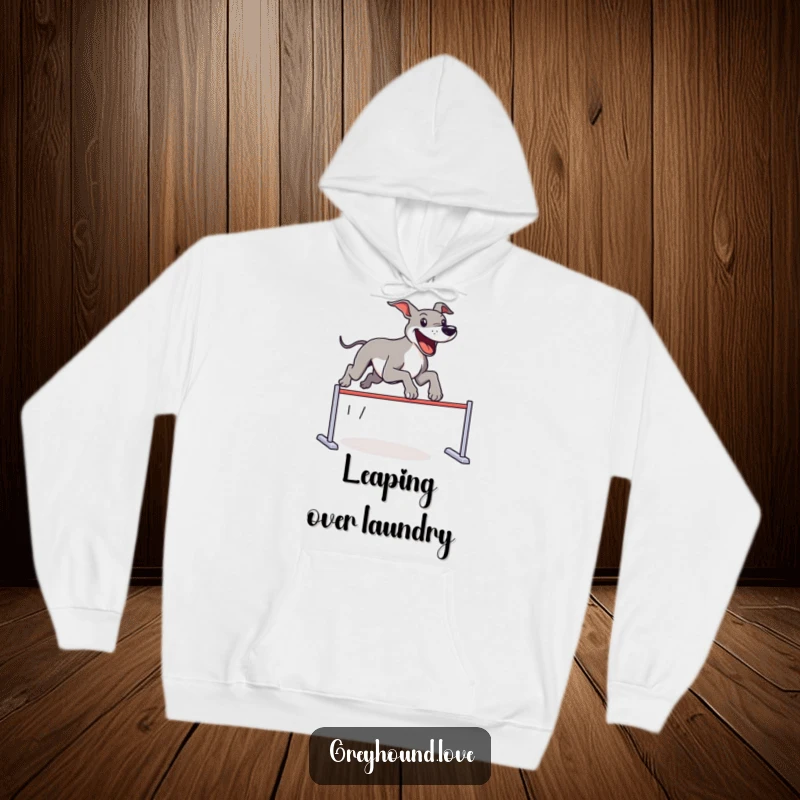 Funny Hoodie depicting a happy greyhound enthusiastically jumping over a non-existent hurdle, embodying pure joy and playful energy.