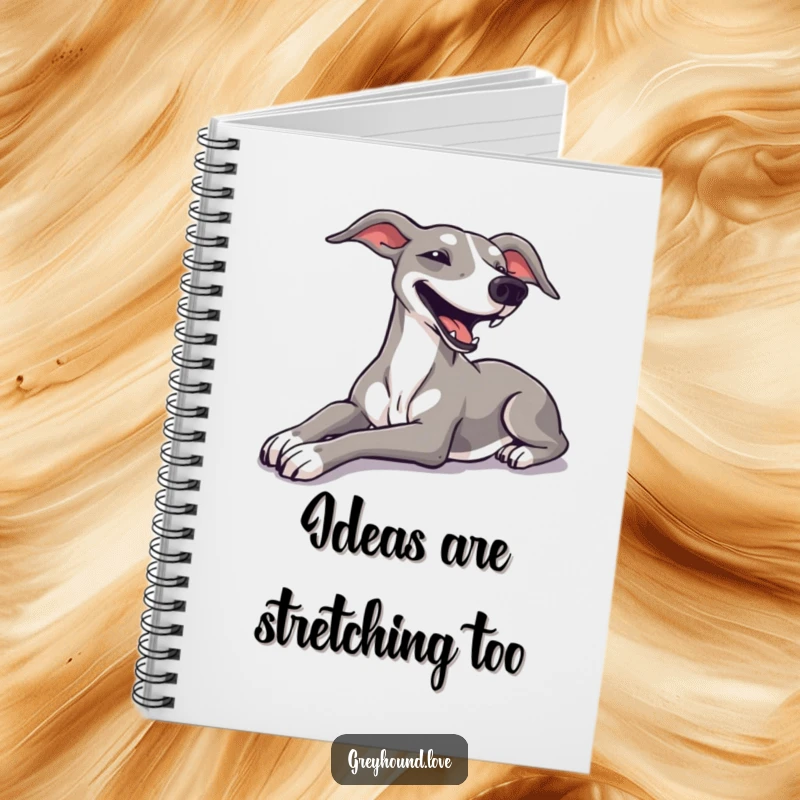 Funny greyhound stretching luxuriously with a happy sigh on the cover of a notebook for journaling.
