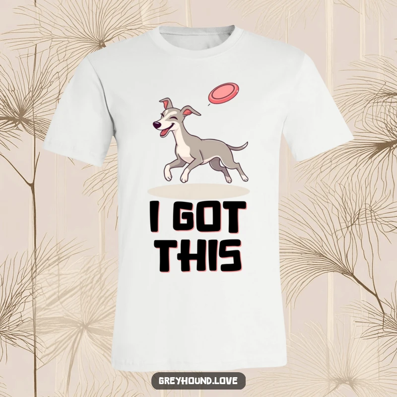 Funny T-Shirt: A greyhound in mid-air gives a playful wink while successfully catching a flying frisbee. Dynamic and funny.