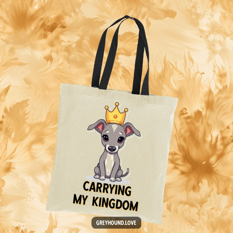 Funny tote bag featuring a greyhound balancing a small crown, signifying regal charm and playful humor.