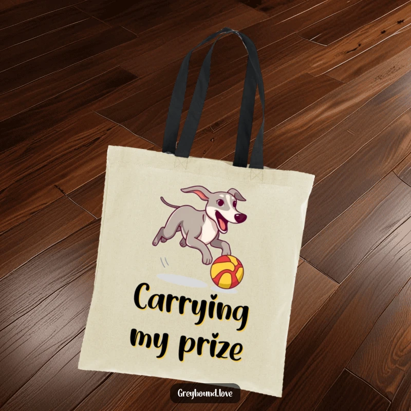 Funny Tote Bag featuring a greyhound excitedly chasing a colorful, stylized ball, perfect for carrying essentials with flair.