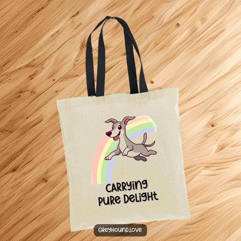 Funny tote bag showing an excited greyhound character leaping over a colorful rainbow with a happy grin.