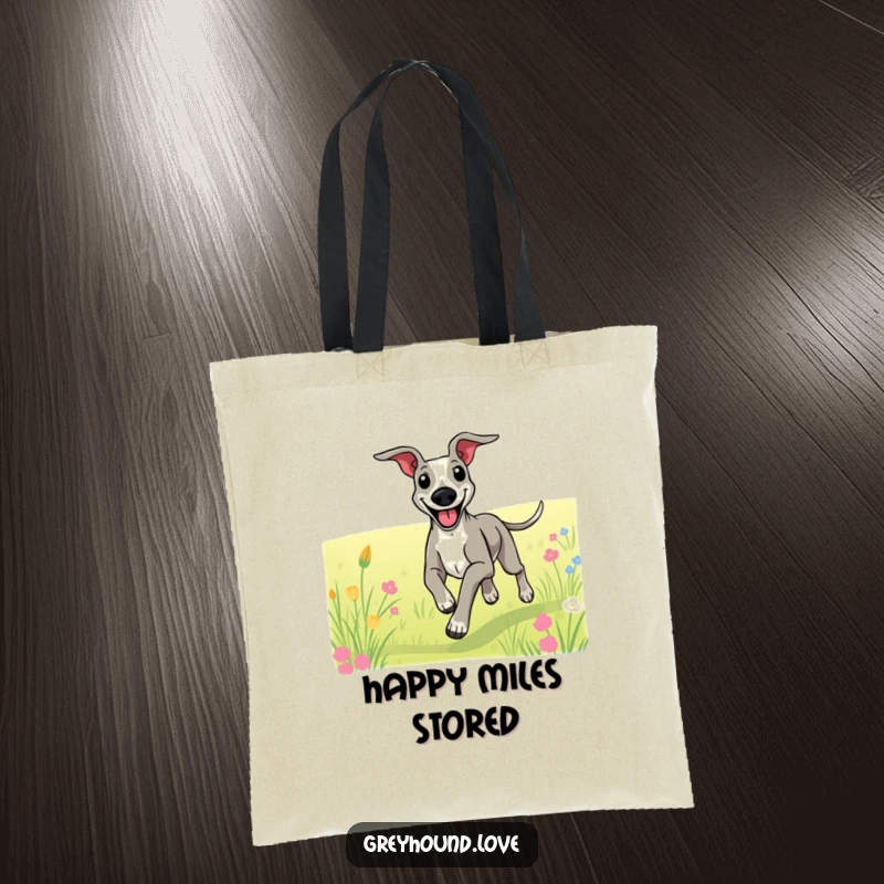 Funny tote bag capturing a greyhound with a big smile, running freely through a scenic field.